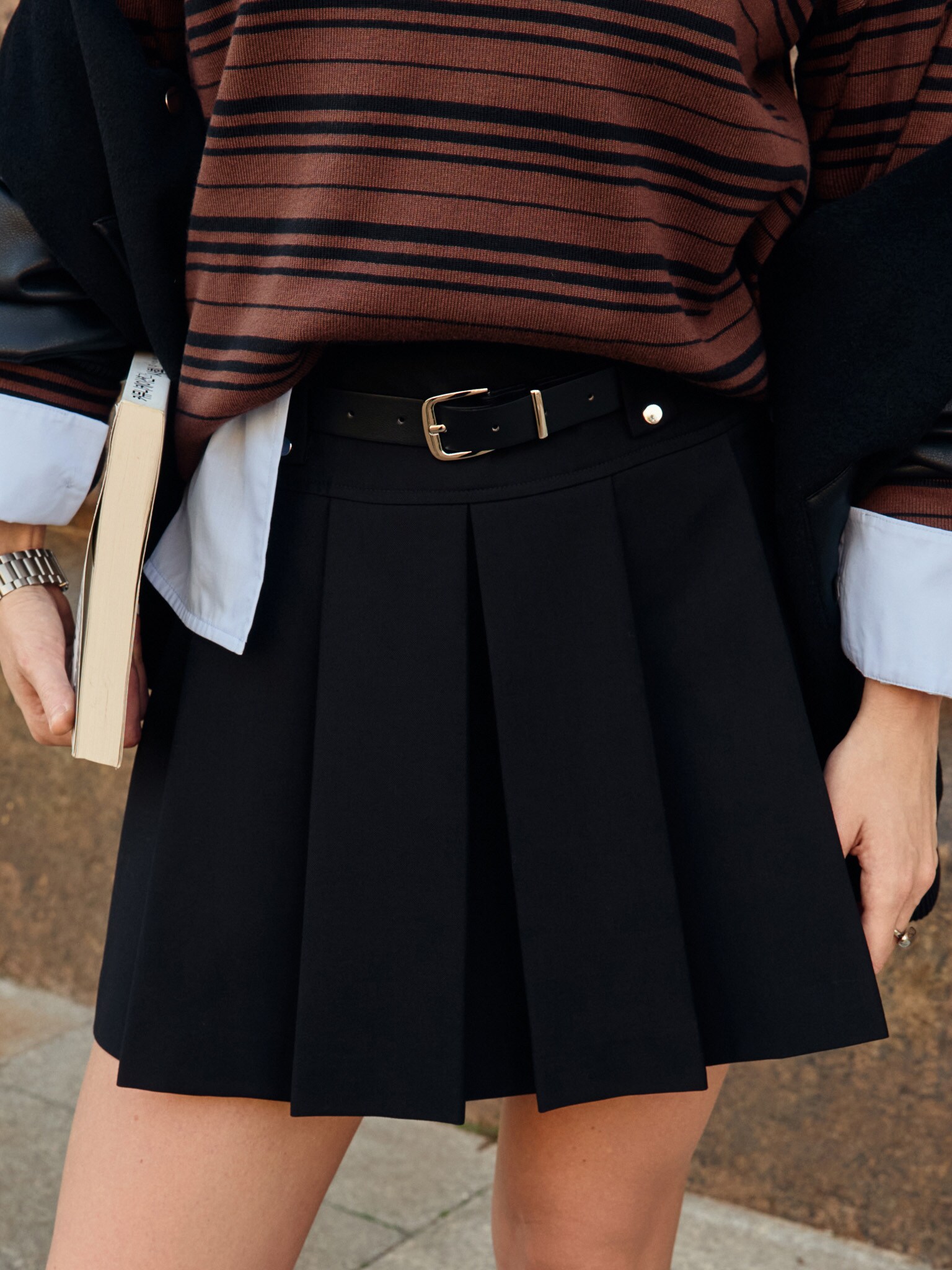 Mini pleated skirt with eco-leather belt