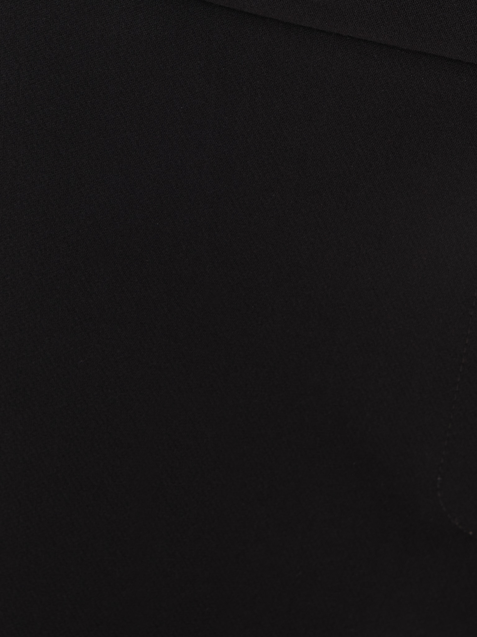 Rozkloszowane spodnie ze strzałkami