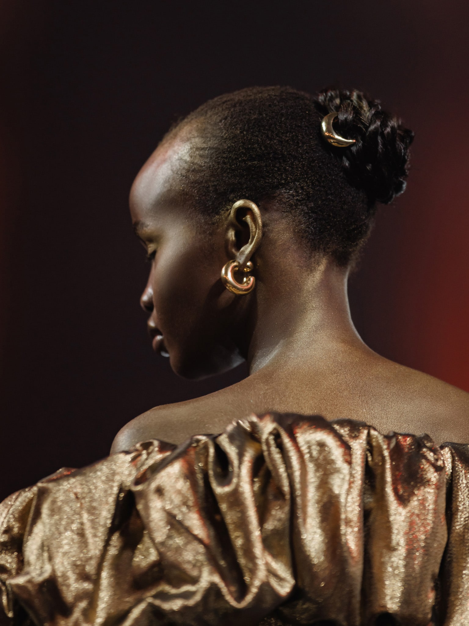 Metallic mini dress with voluminous detail on the bodice