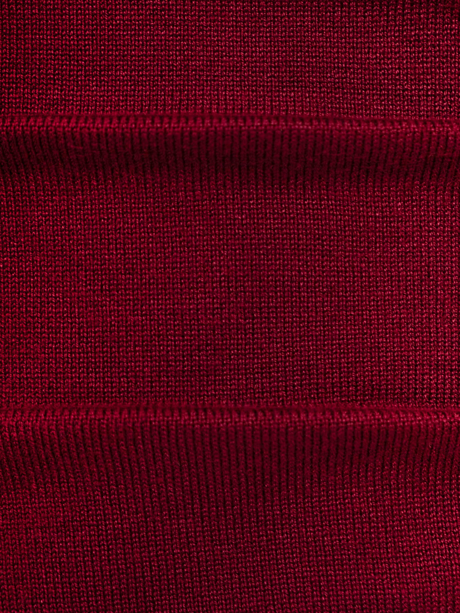 Knitted jumper with draperies