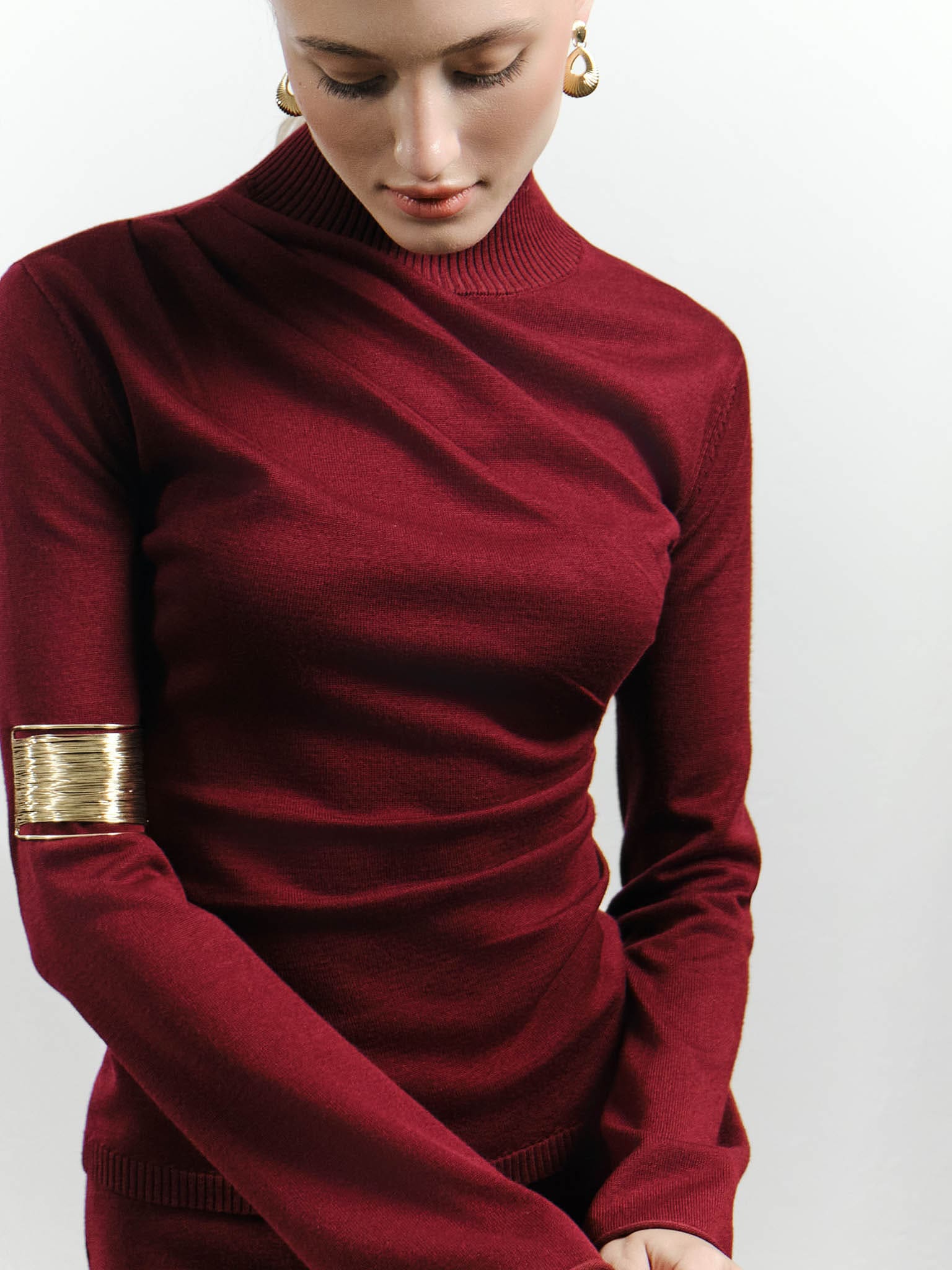 Knitted jumper with draperies
