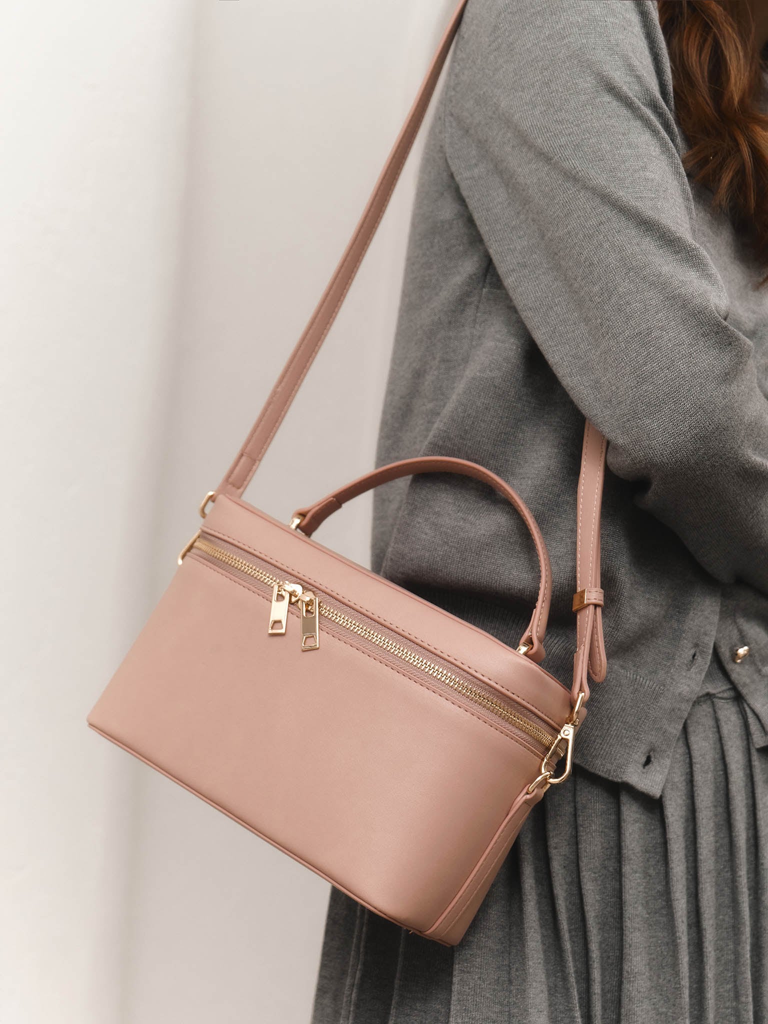 Cylindrical eco-leather bag with thin strap