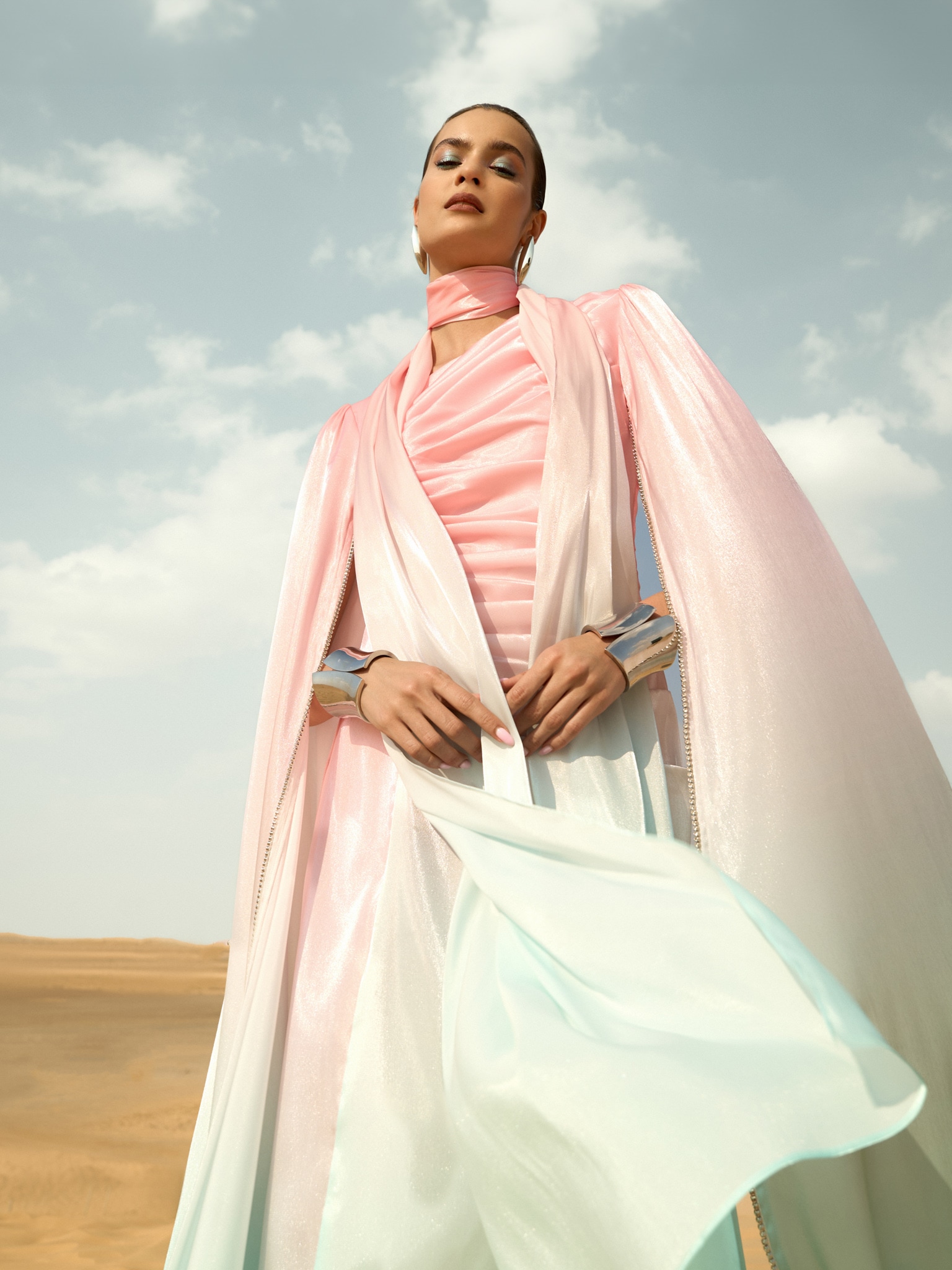 Maxi dress with asymmetric neckline and rhinestone embellishment on the sleeves