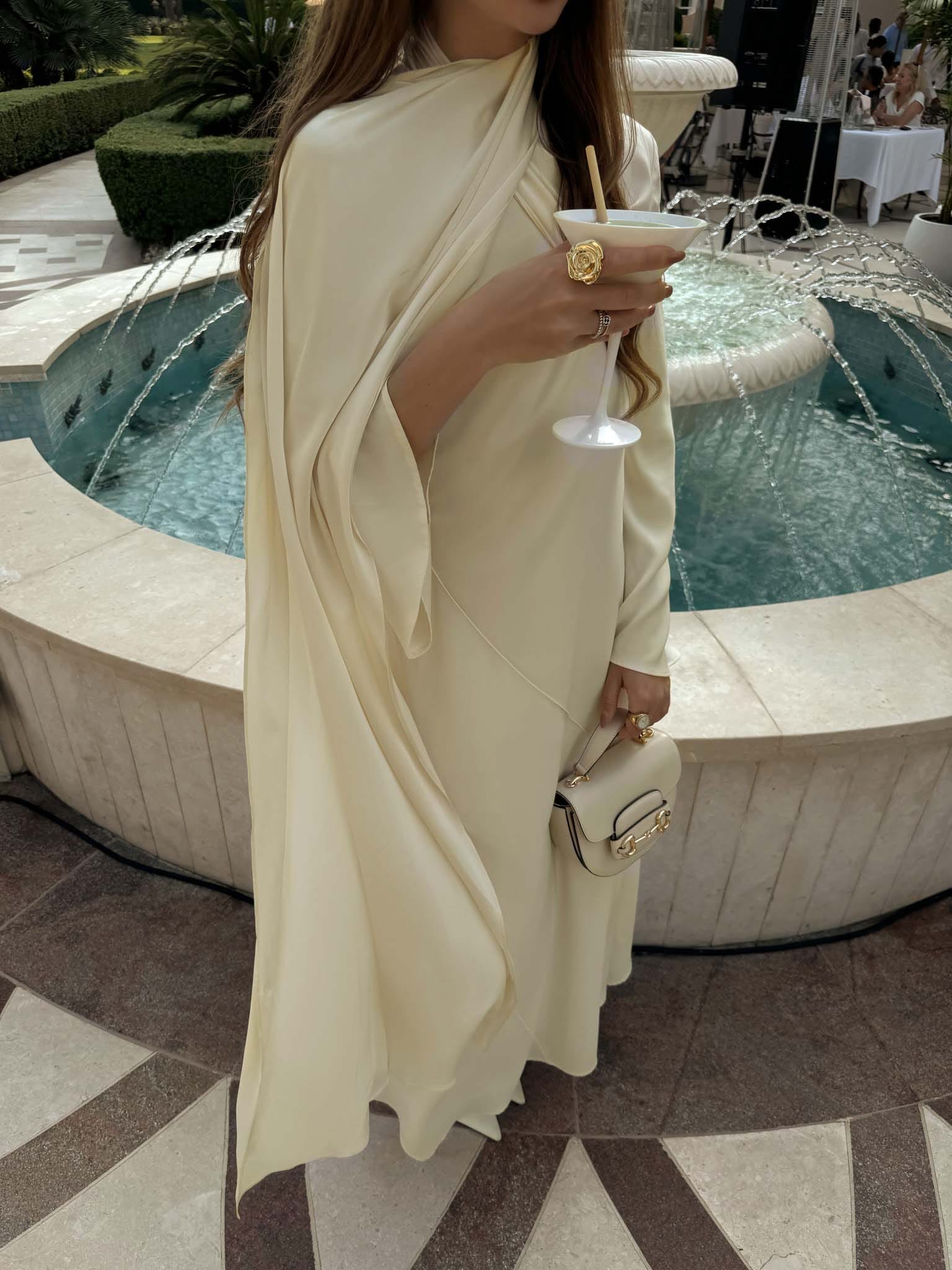 Maxi dress with asymmetrical draped bodice