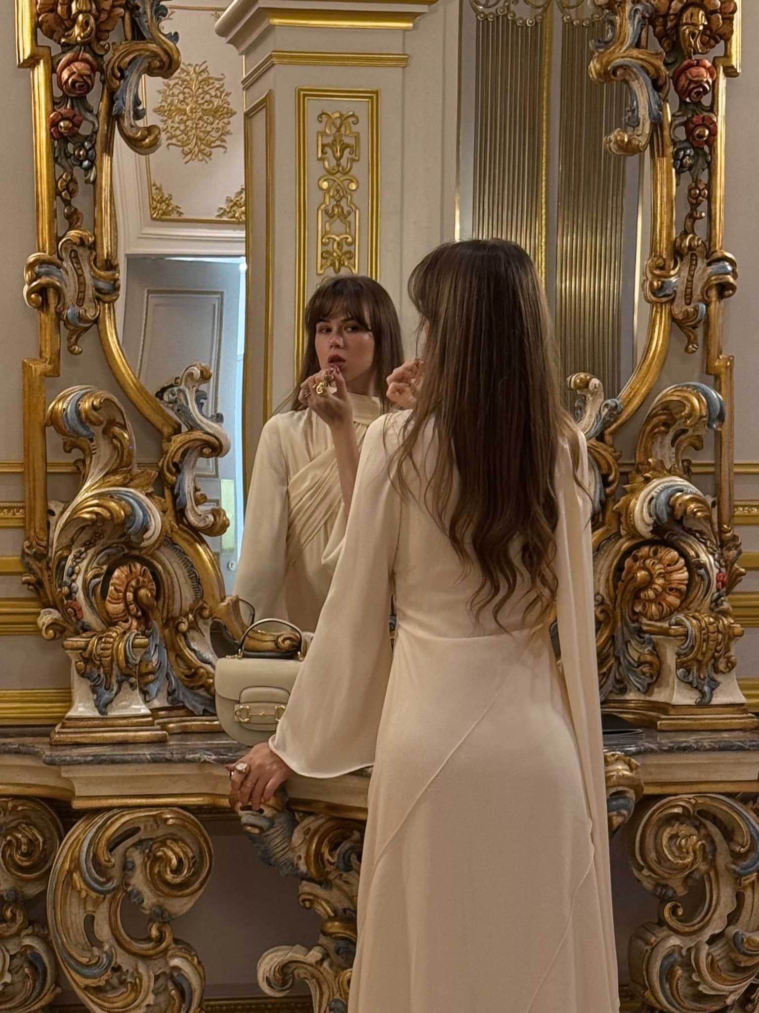 Maxi dress with asymmetrical draped bodice