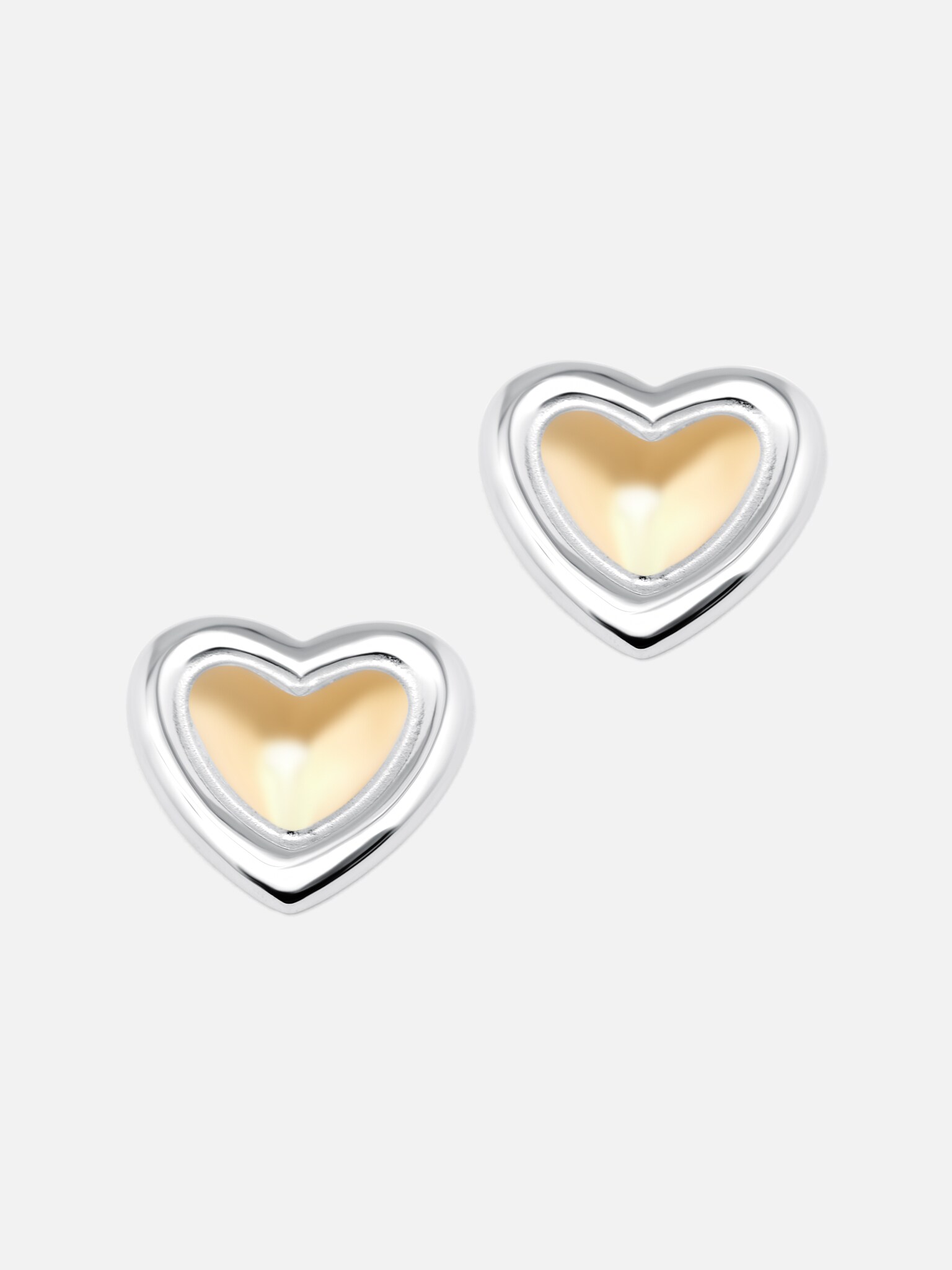 Two metal heart earrings :: LICHI - Online fashion store Two metal heart earrings :: LICHI - Online fashion store