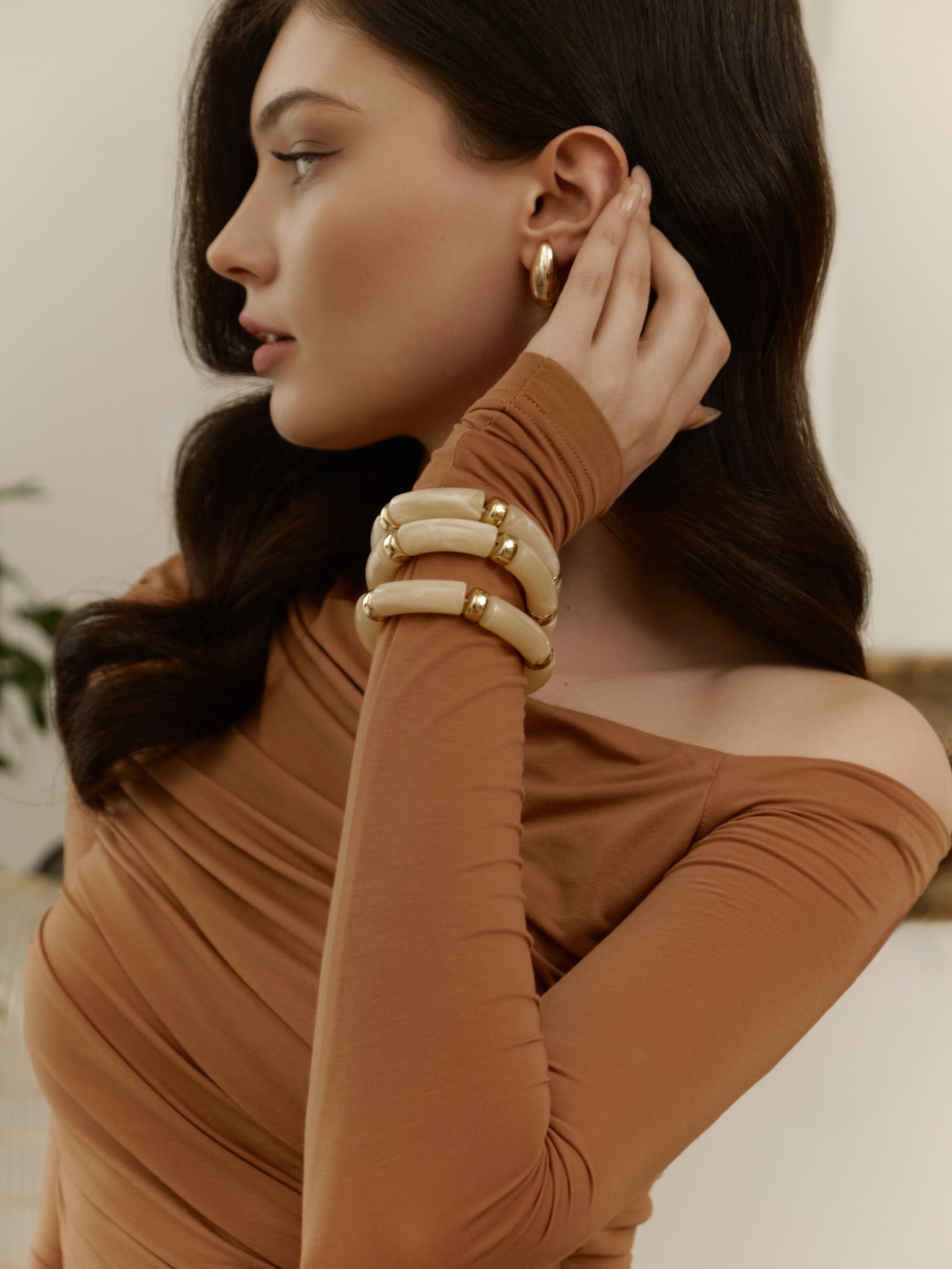 Set of three bracelets with golden inserts