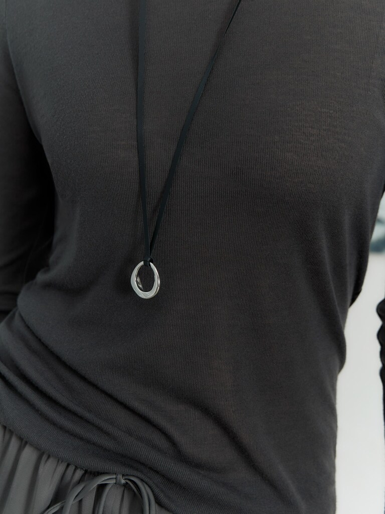 Lace necklace with metal pendant