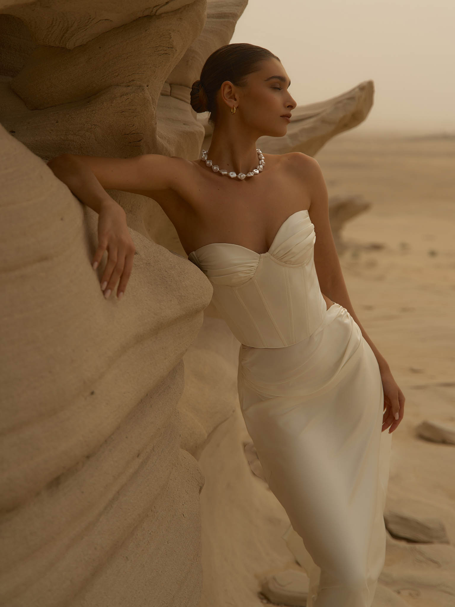 Satin maxi skirt with draping on the hips