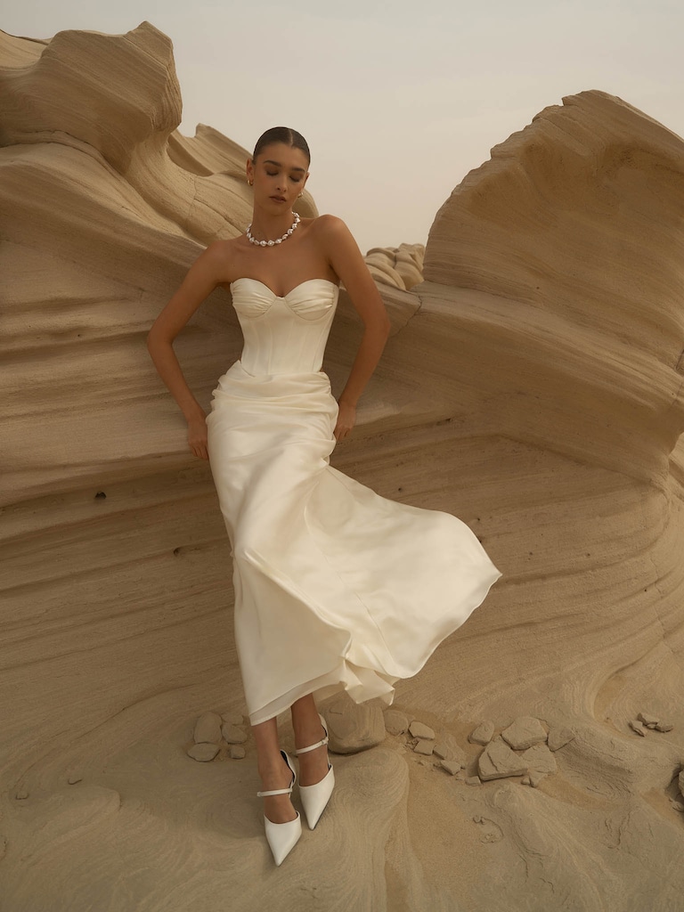 Satin maxi skirt with draping on the hips