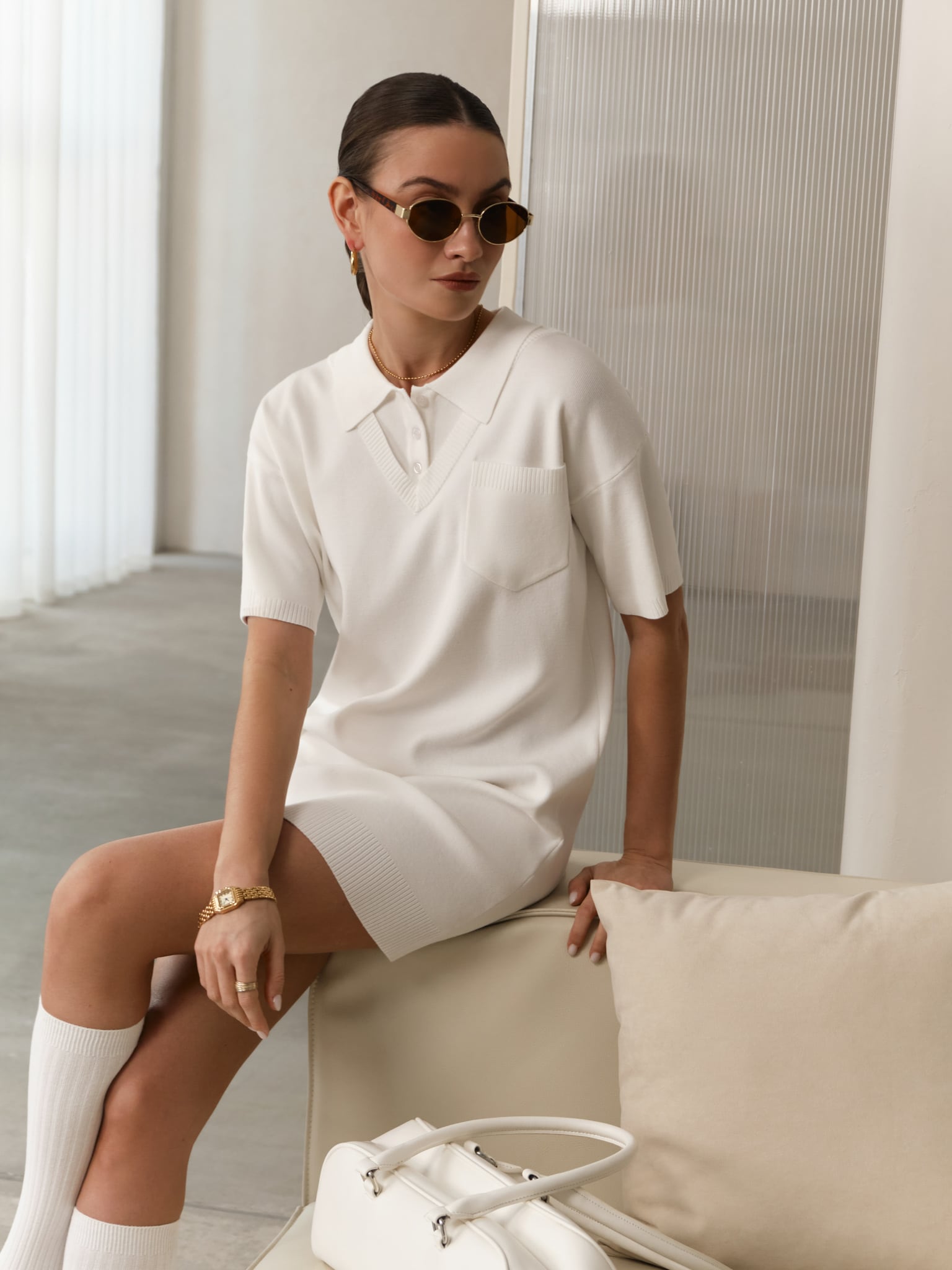 Mini knitted dress with polo collar