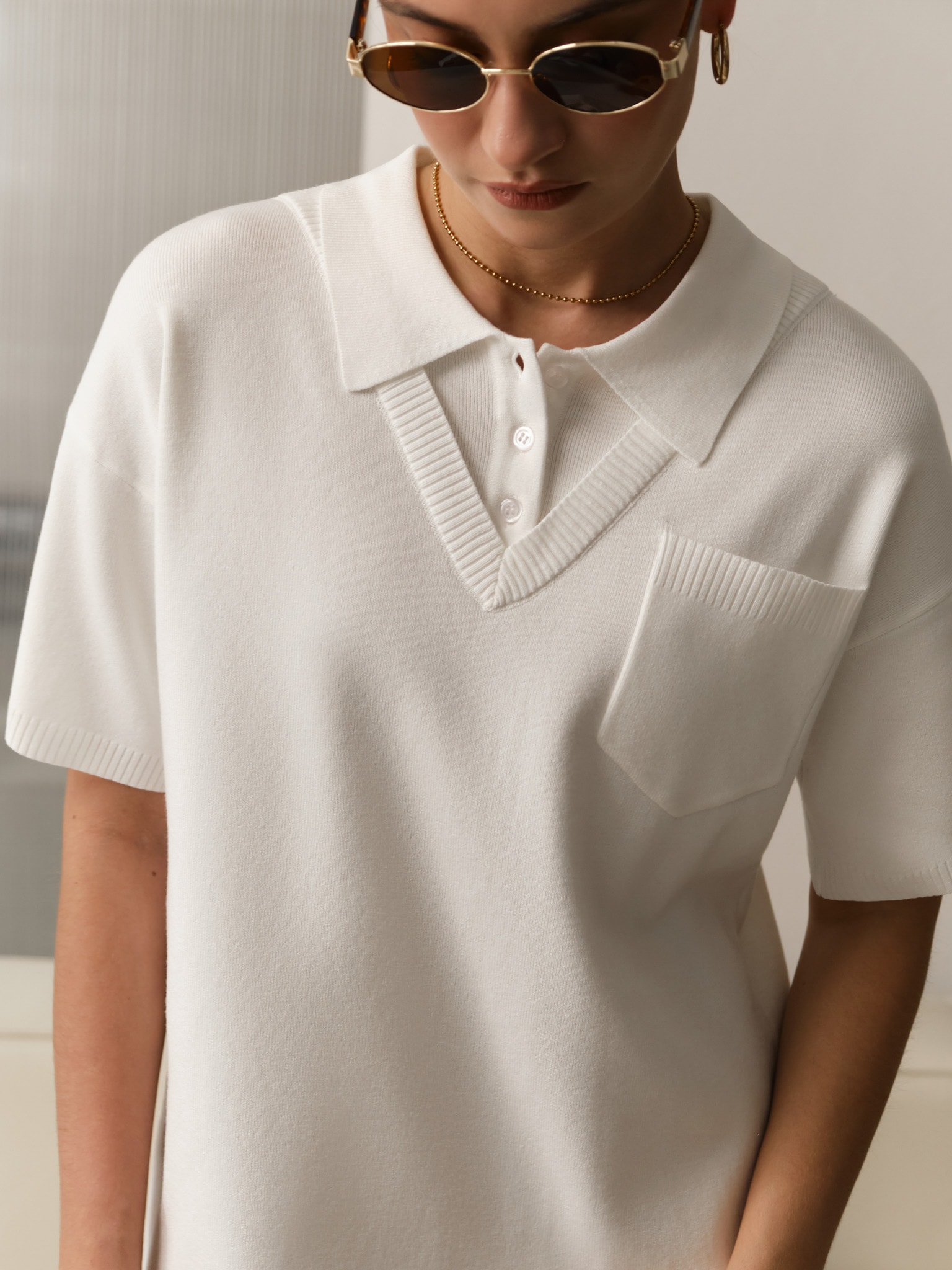 Mini knitted dress with polo collar