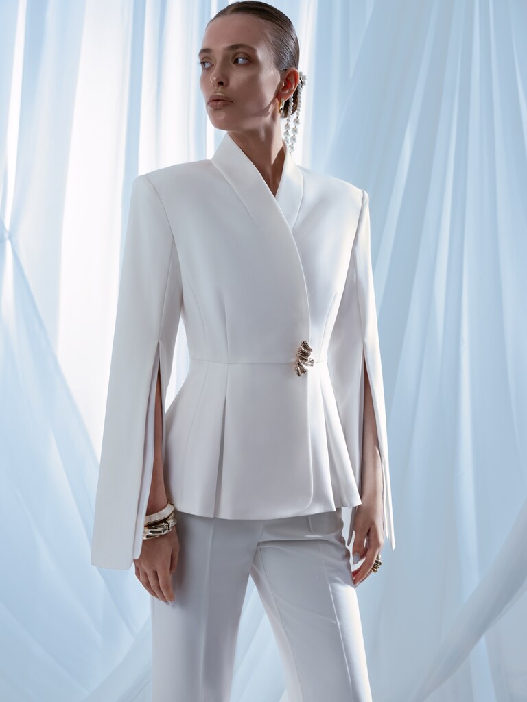 Flared jacket with slits on sleeves