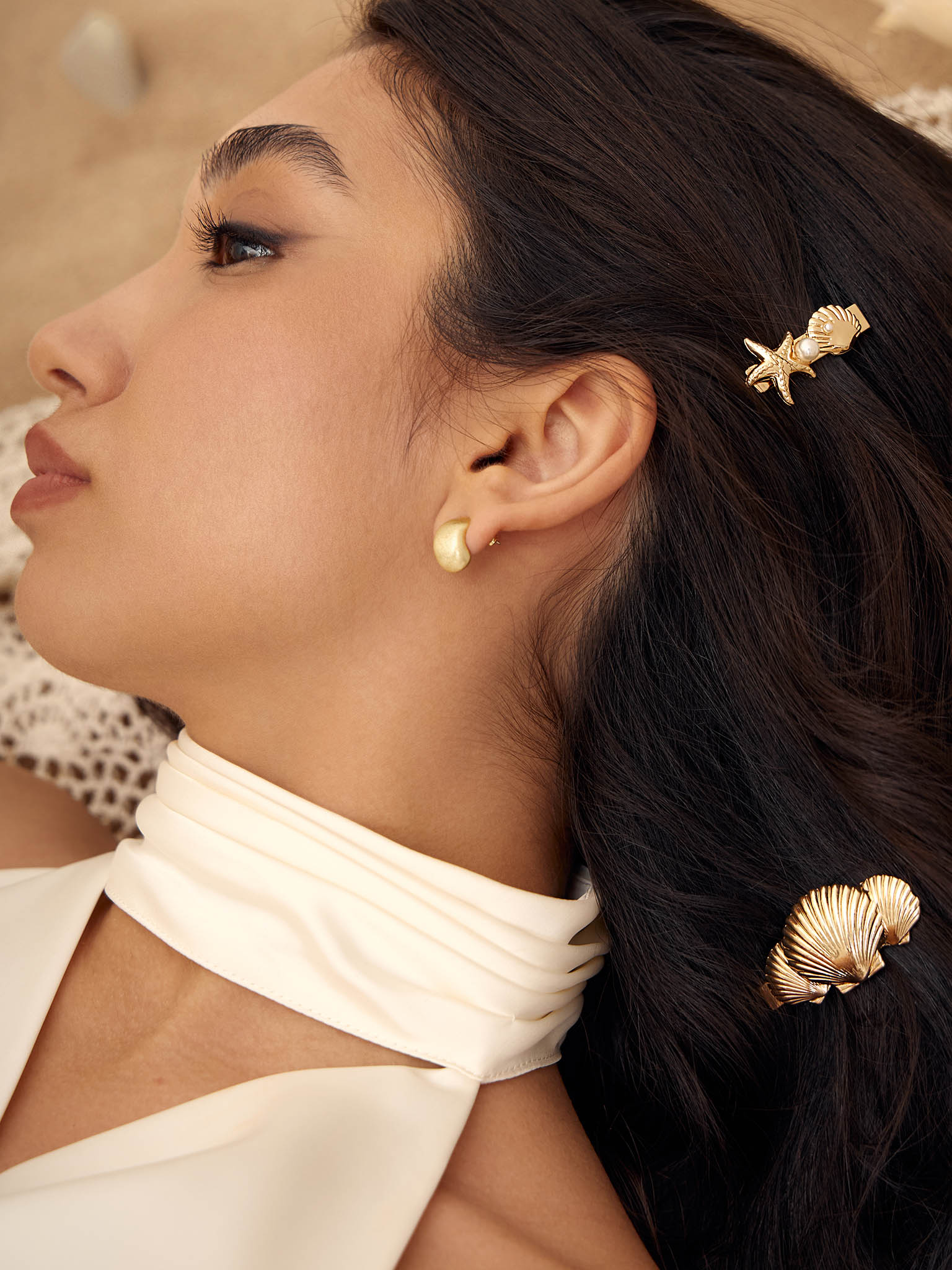 Golden hair clip with marine decor