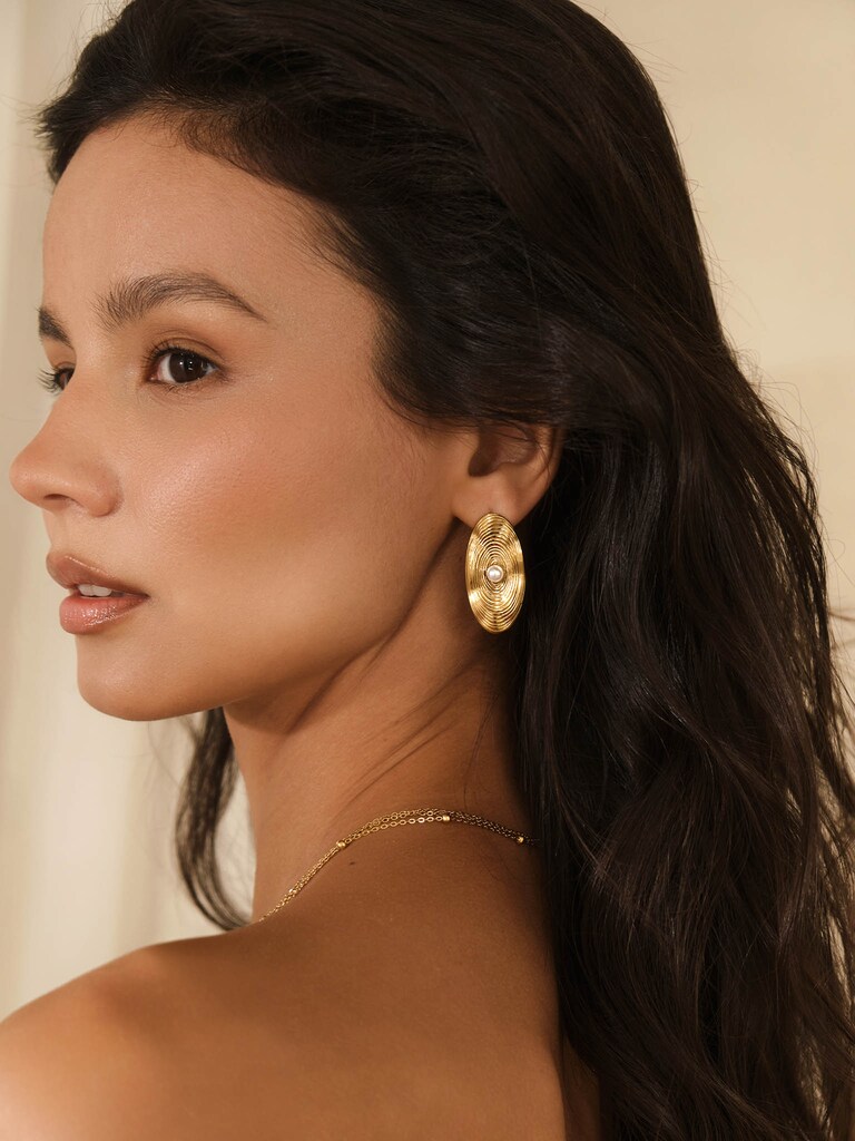 Овальные серьги из фактурного металла