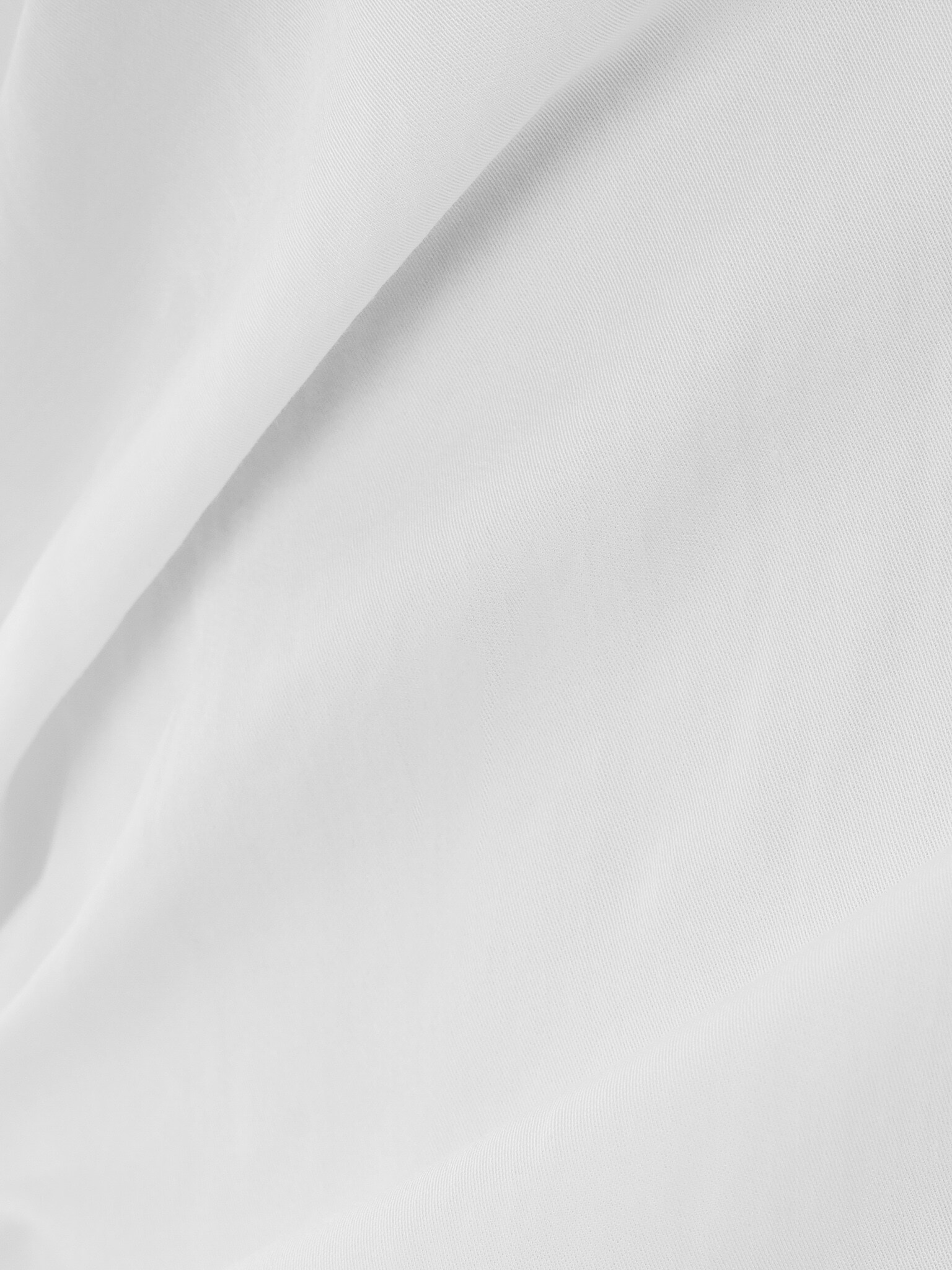 Ausgestelltes Oberteil mit drapierter Brust