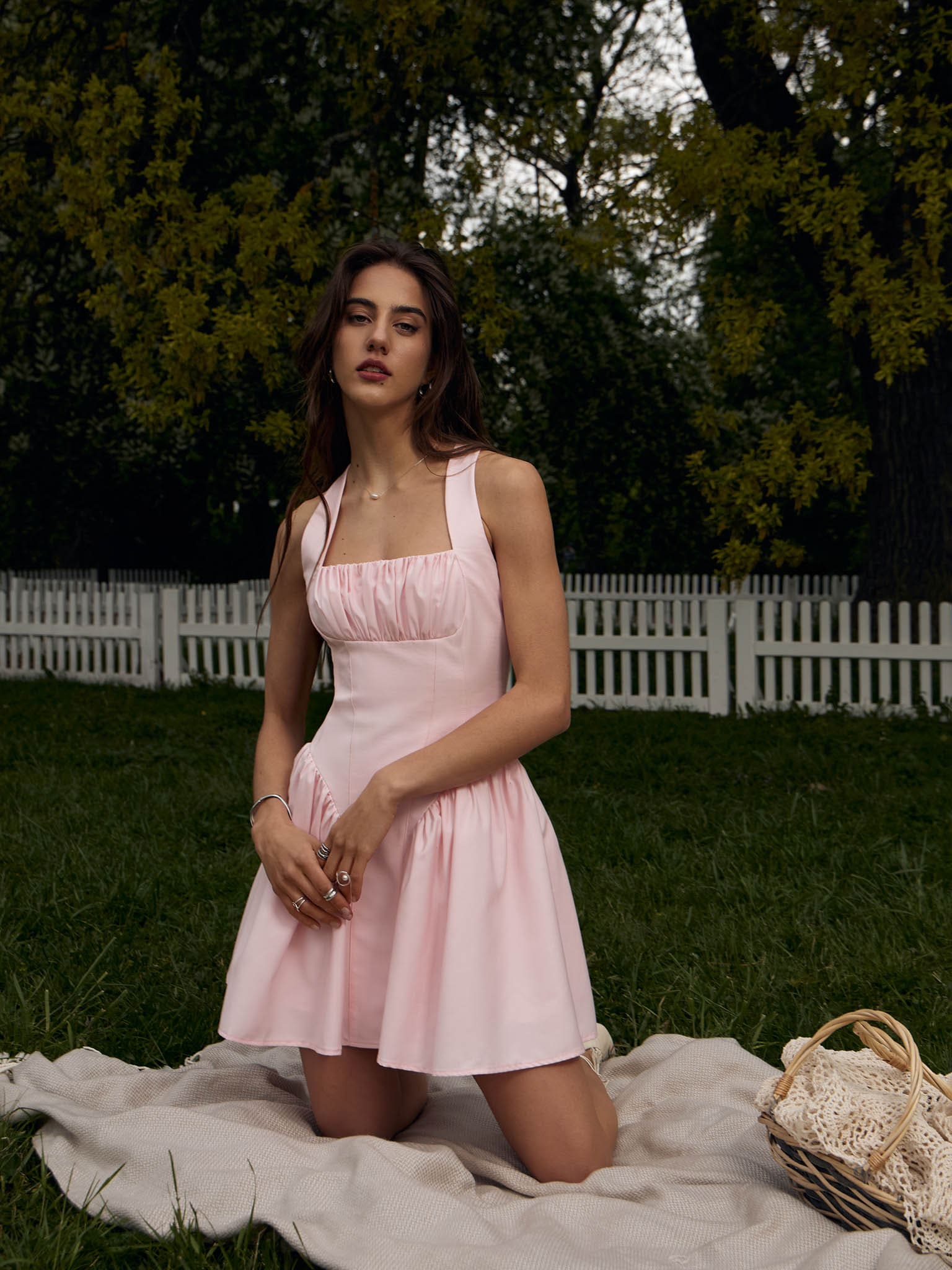 Strappy mini dress with V-shaped insert on the skirt