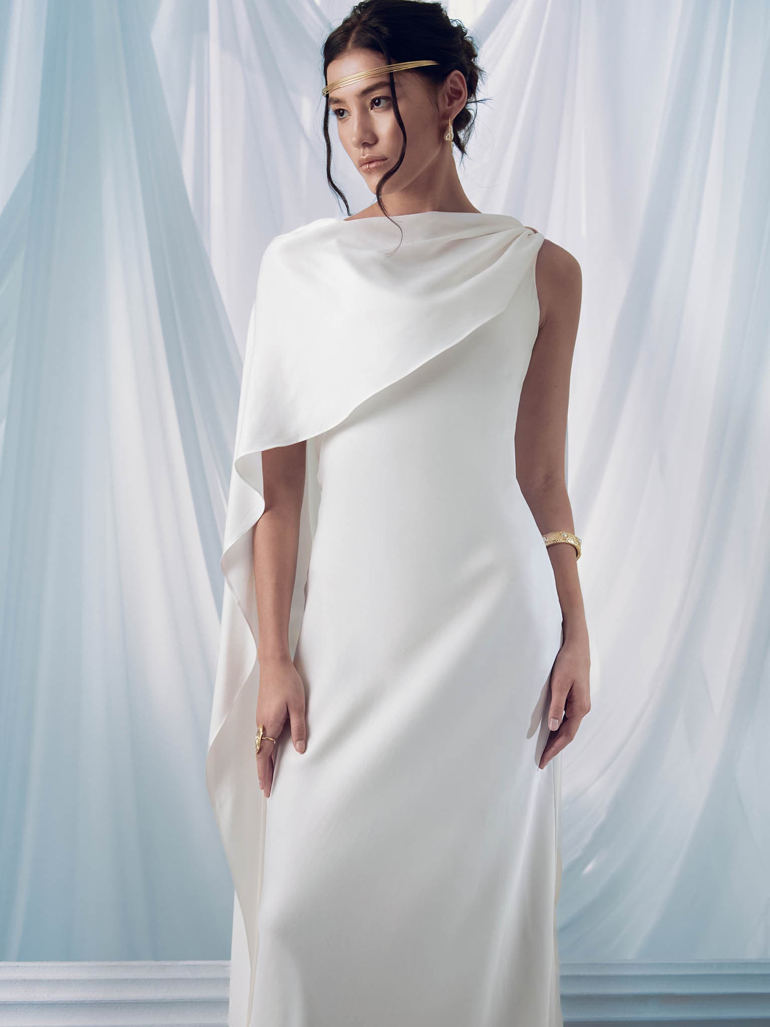 Light maxi dress with cape and metallic decoration