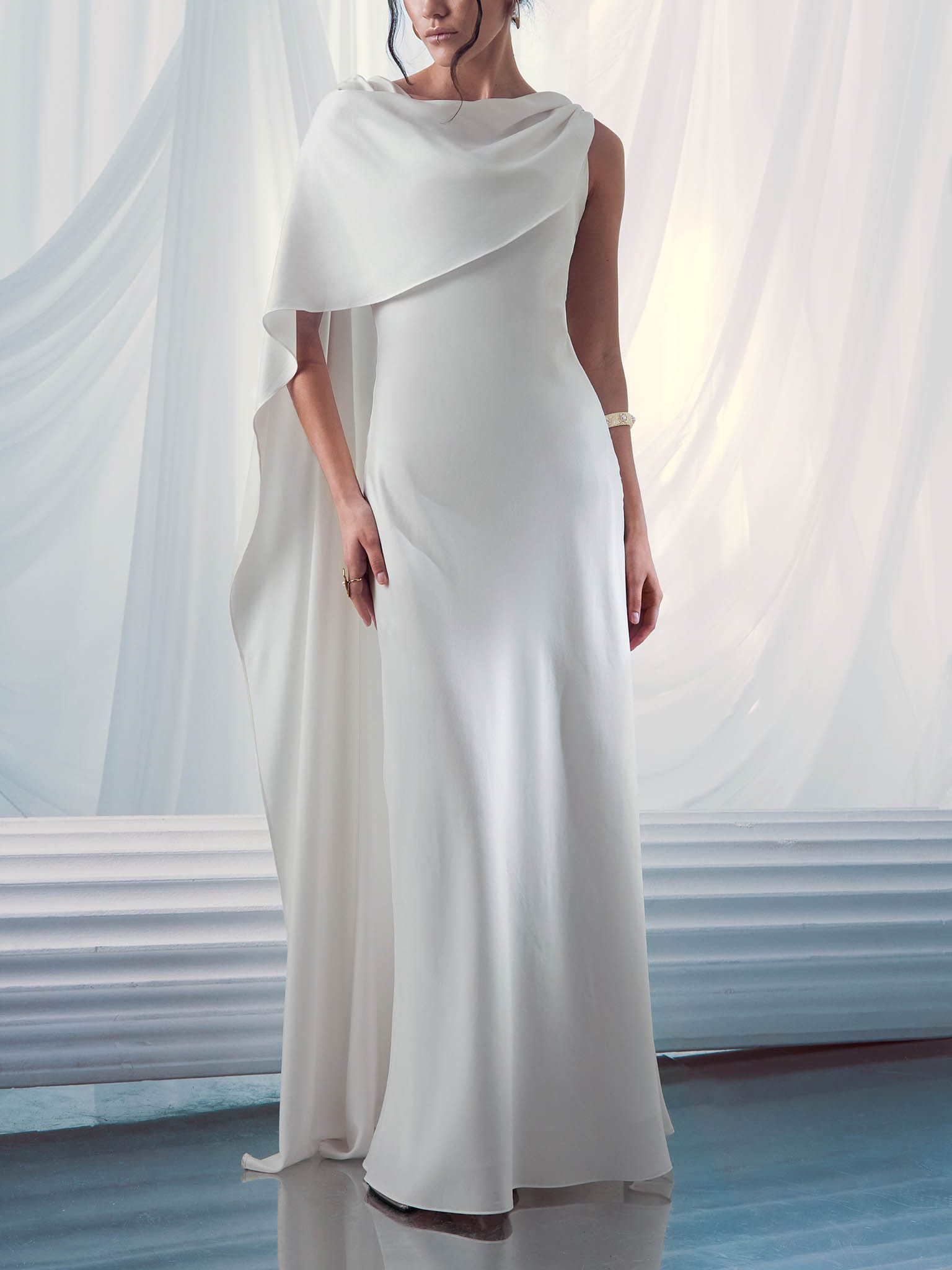 Light maxi dress with cape and metallic decoration
