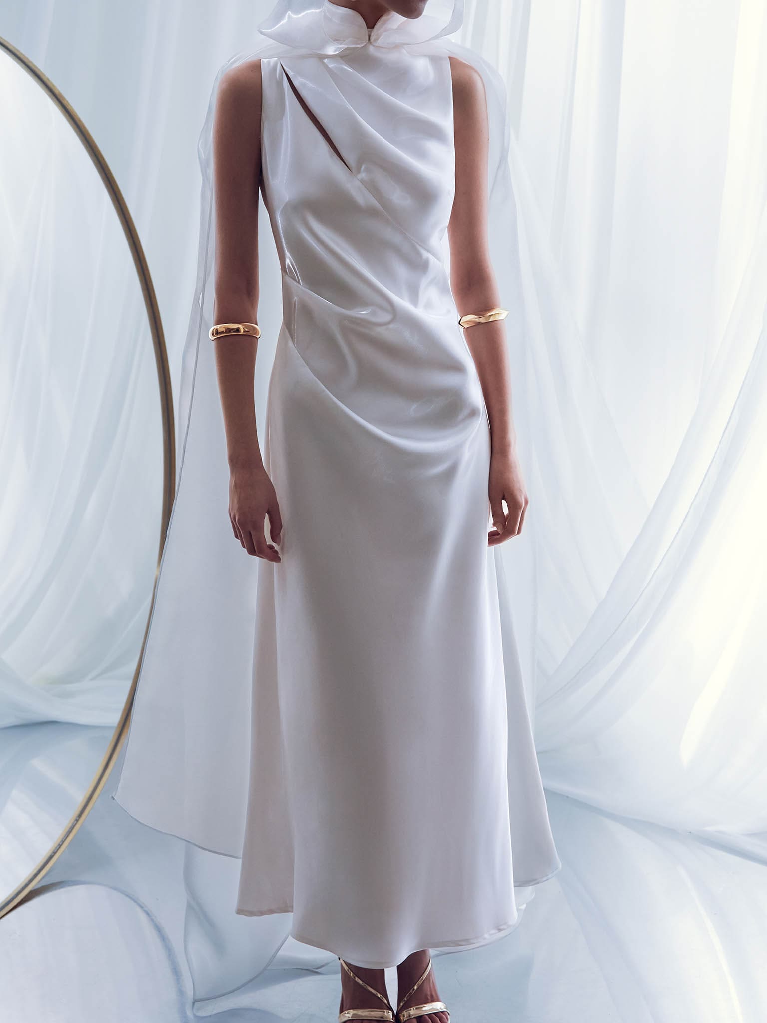 Glossy fabric maxi dress with asymmetrical draperies