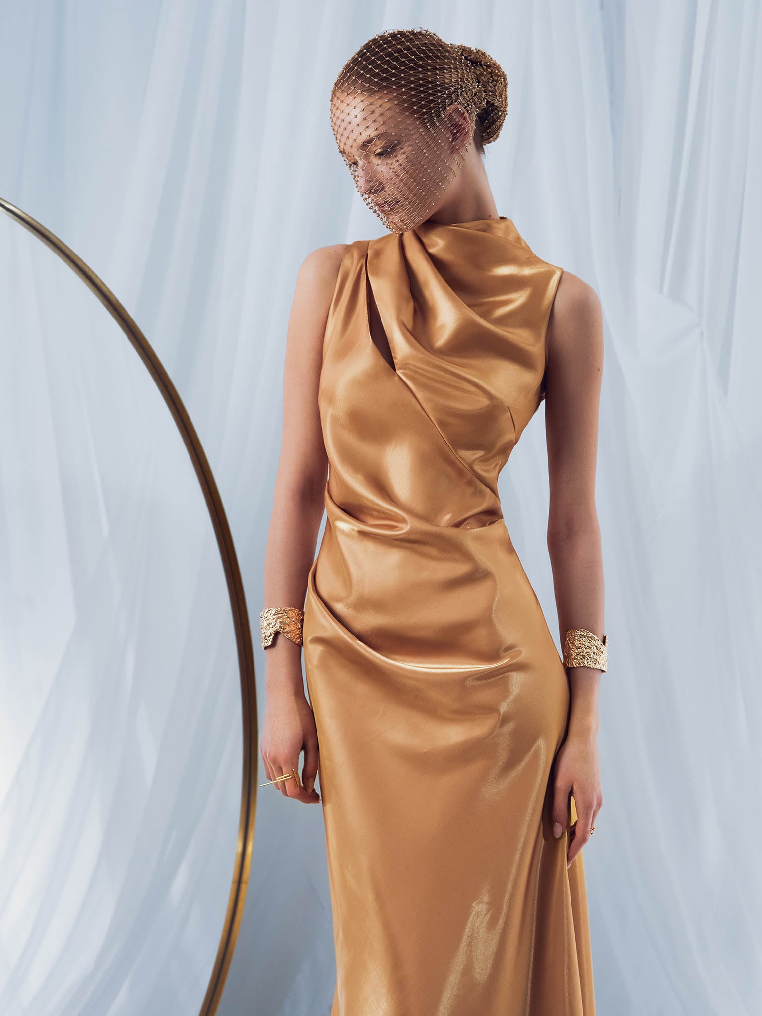 Glossy fabric maxi dress with asymmetrical draperies