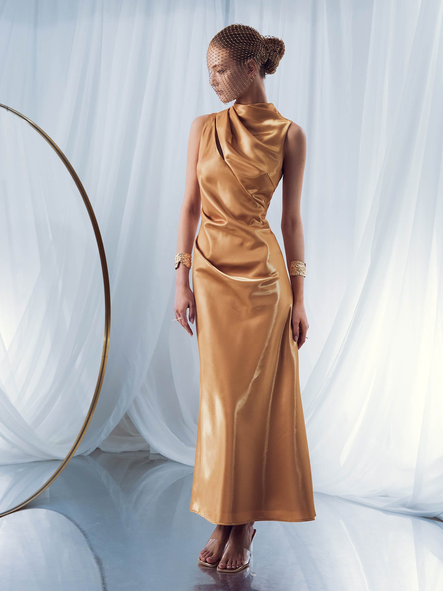 Glossy fabric maxi dress with asymmetrical draperies