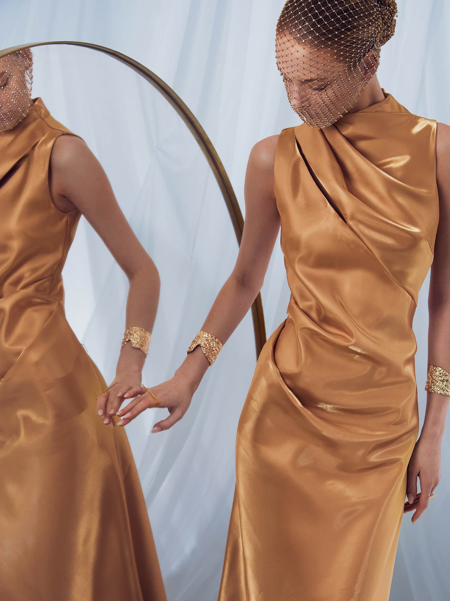 Glossy fabric maxi dress with asymmetrical draperies