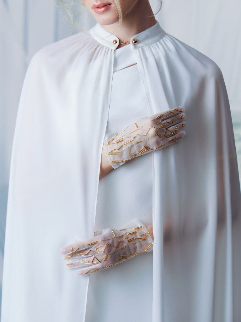 Semi-transparent gloves with golden decorations