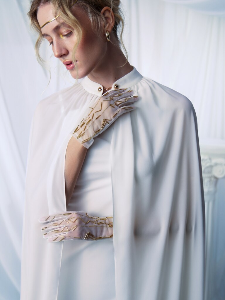 Semi-transparent gloves with golden decorations