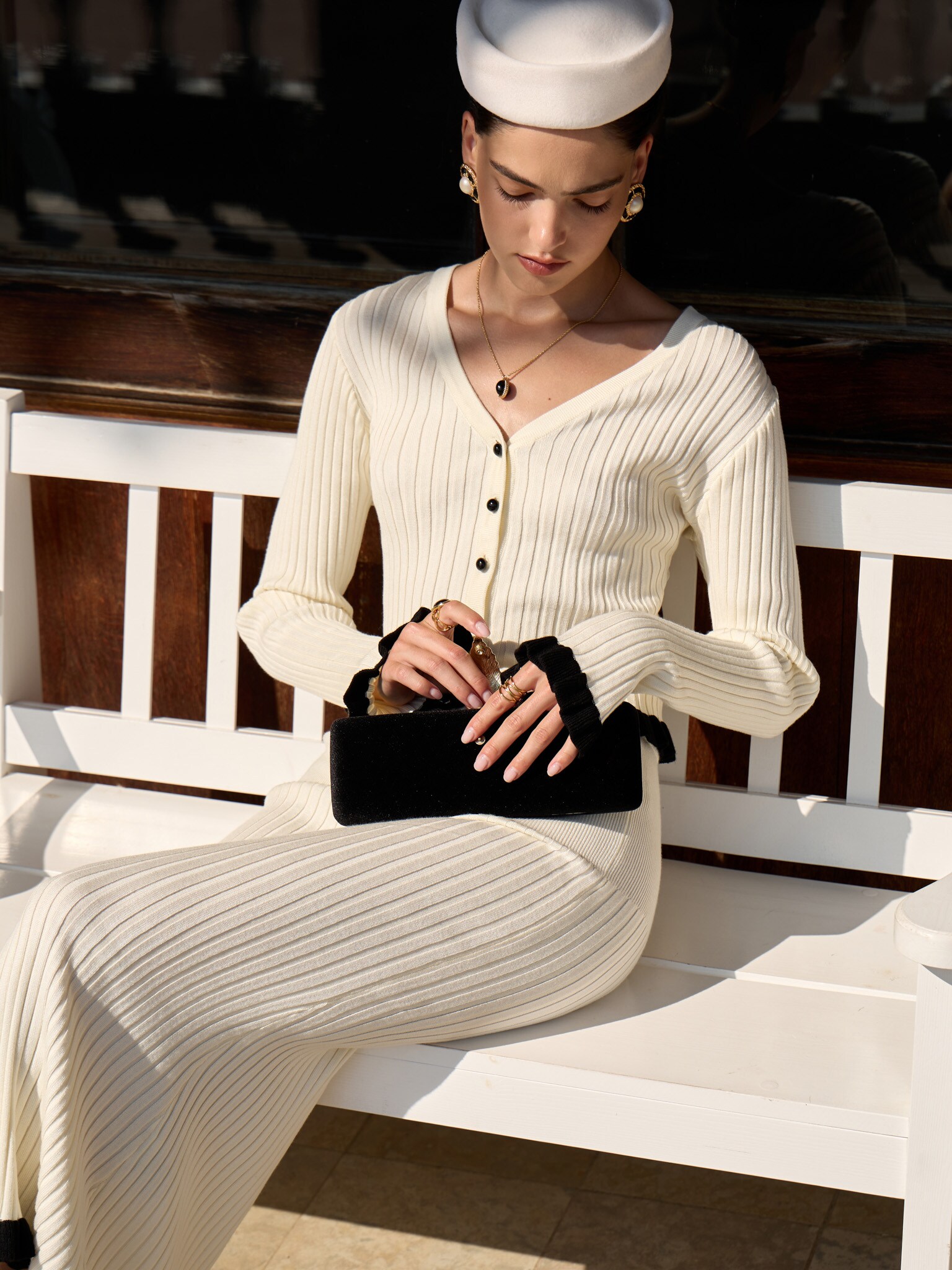 Rib-knit cardigan with contrasting ruffles