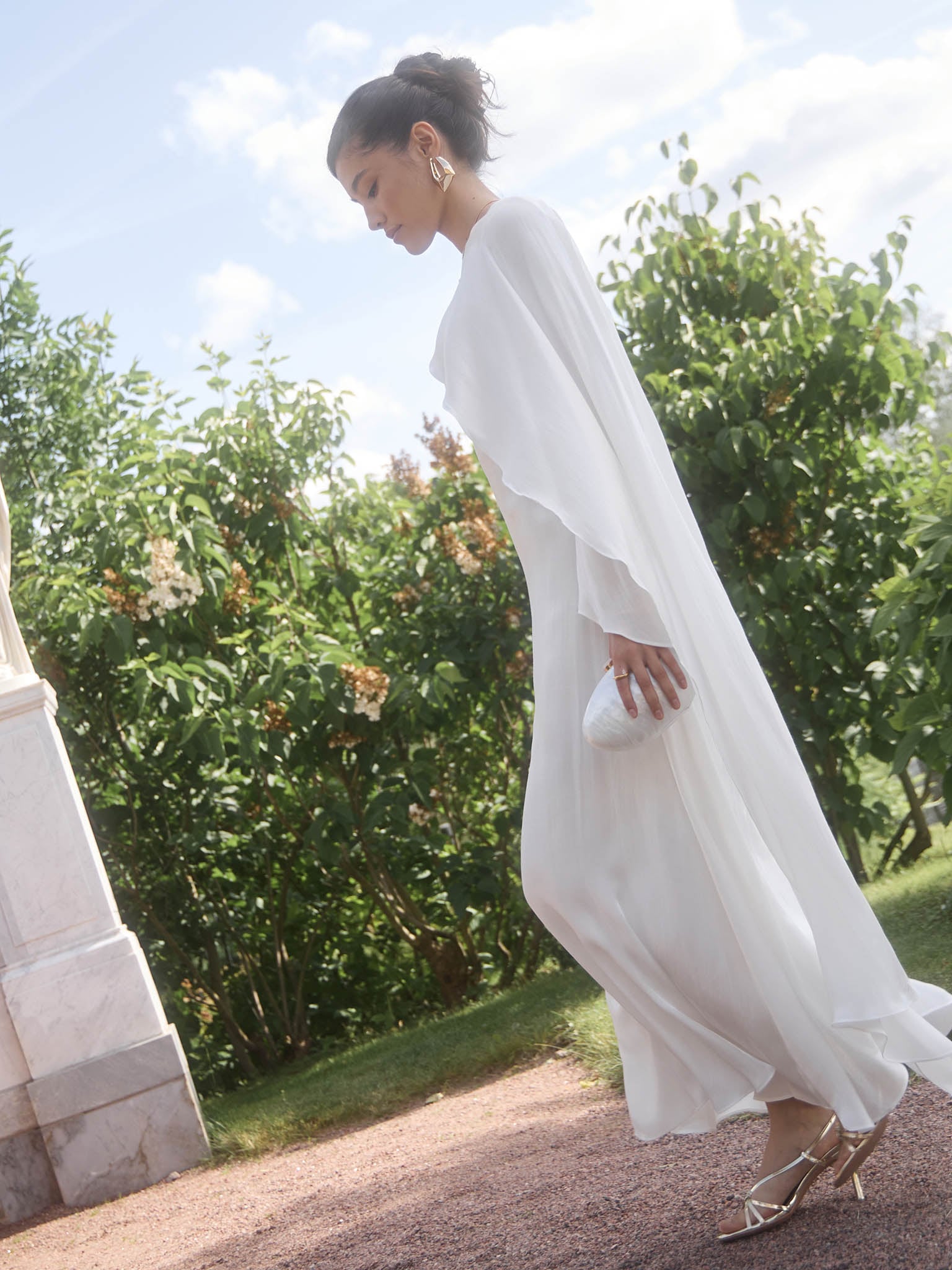 Textured maxi dress with one shoulder cape