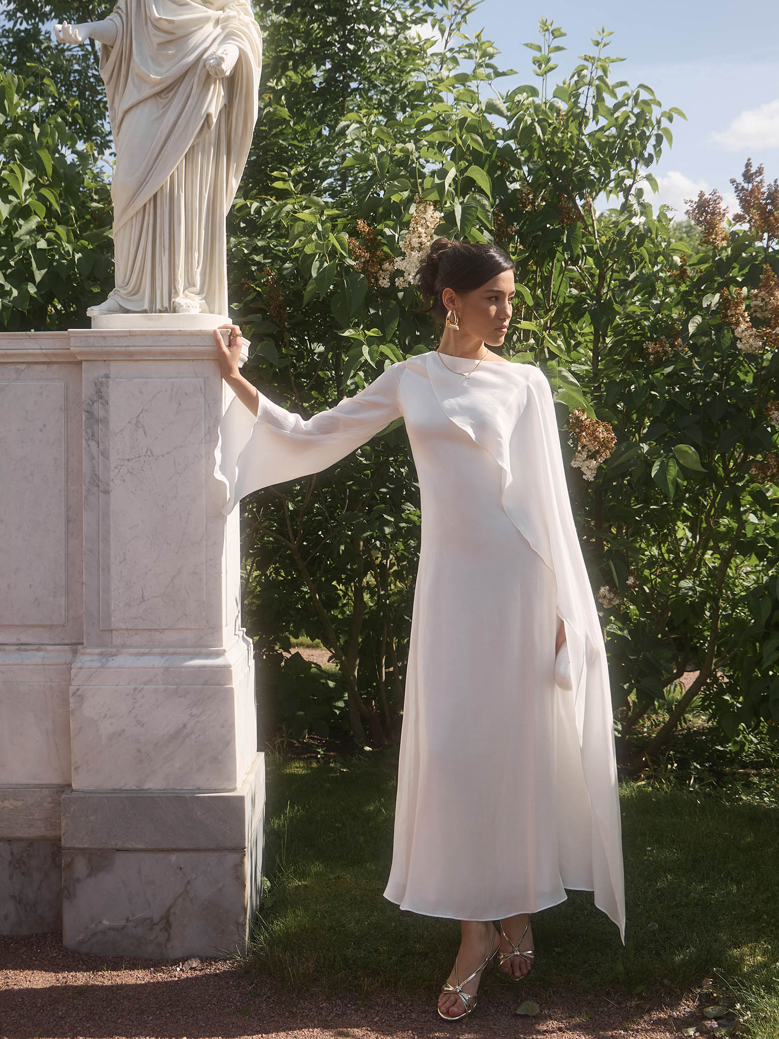 Textured maxi dress with one shoulder cape