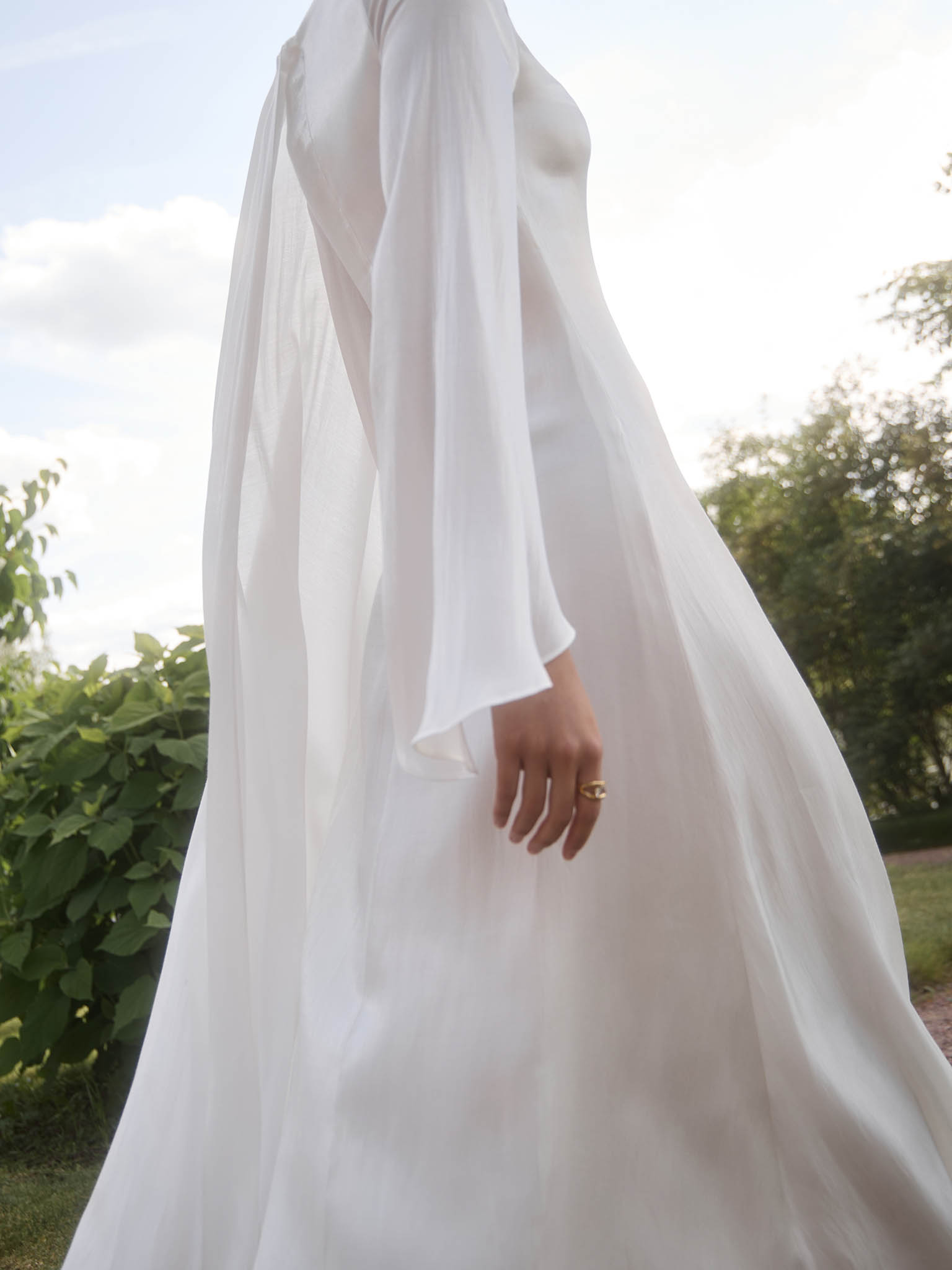 Textured maxi dress with one shoulder cape