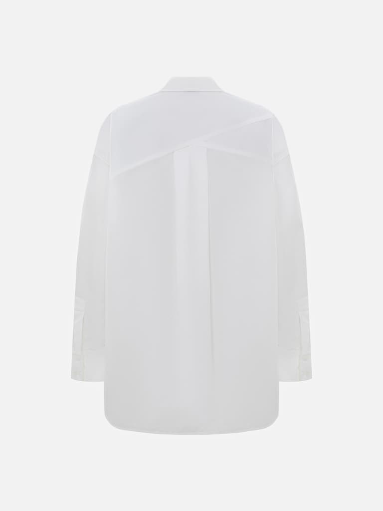 قميص كبير الحجم مع جيب كبير على الصدر