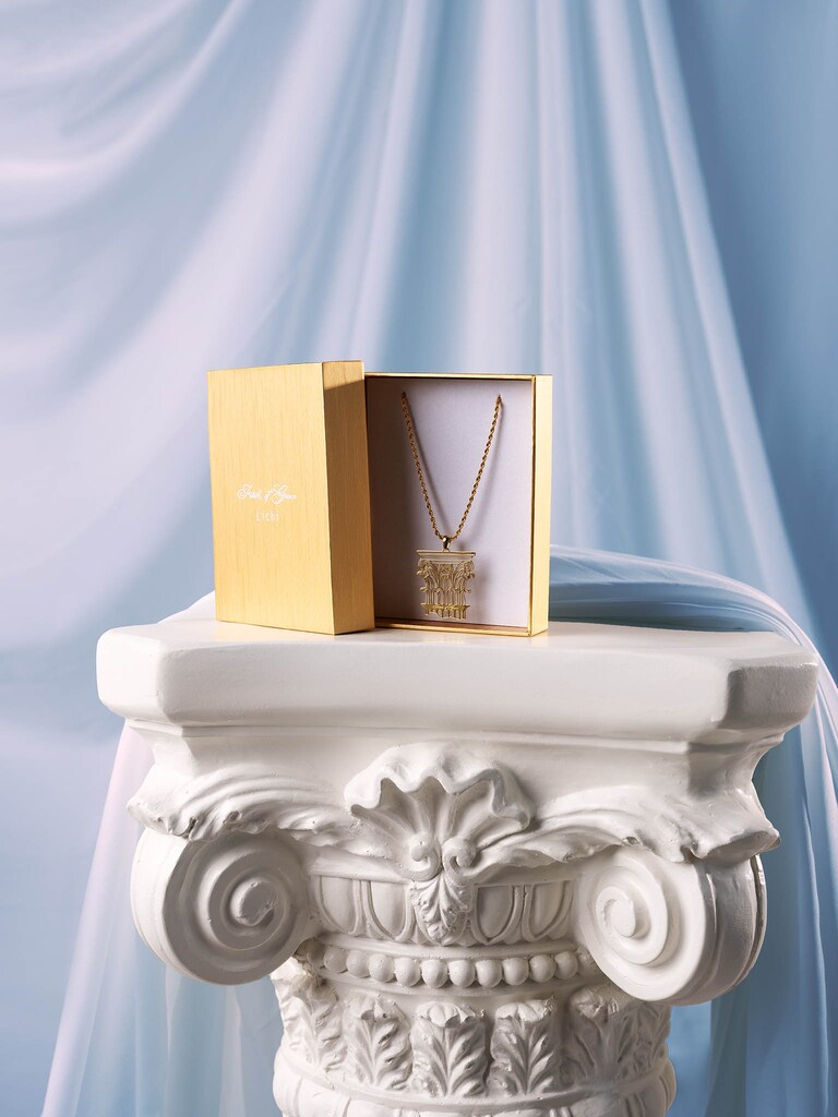 Golden necklace with antique pendant