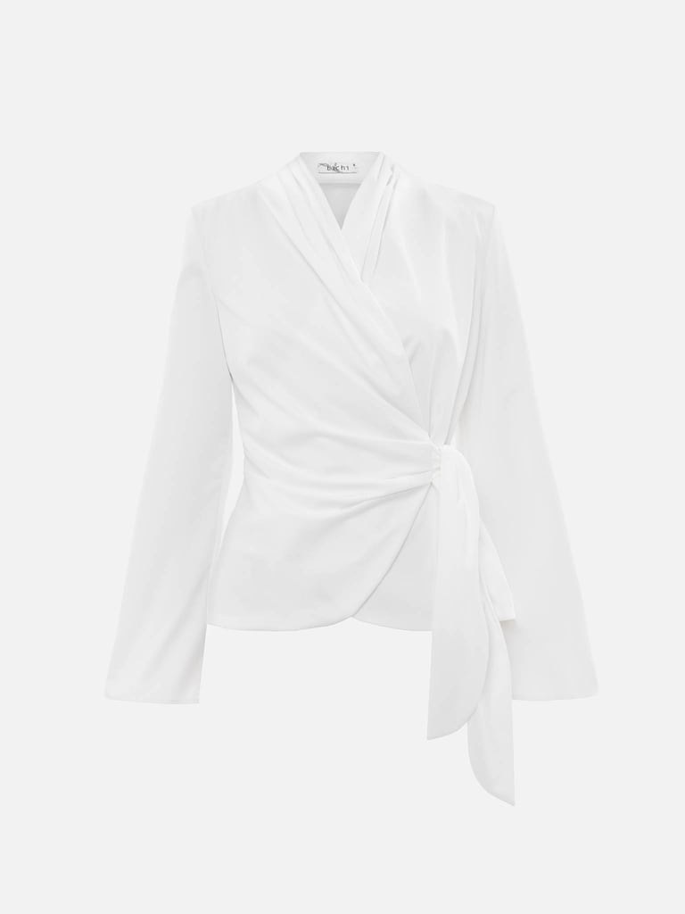 Flared blouse with waist ribbons