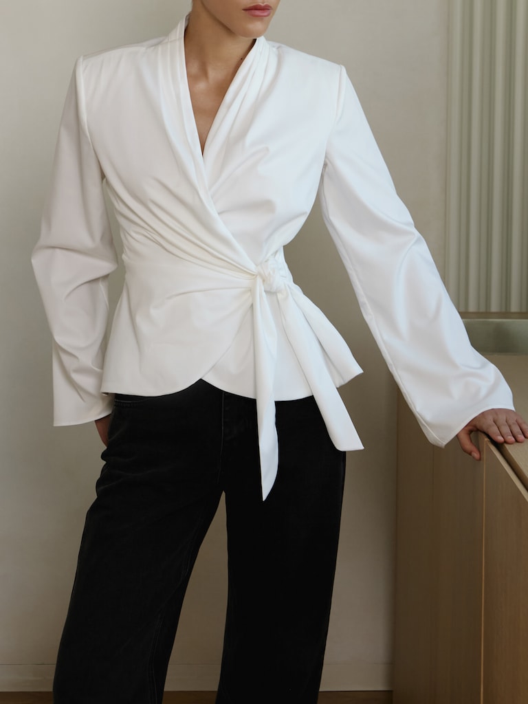 Flared blouse with waist ribbons