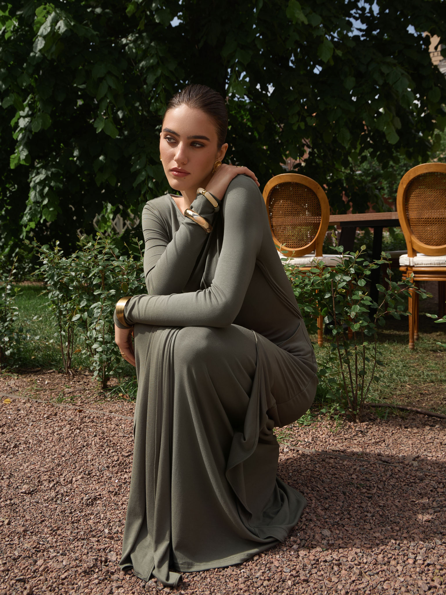 Fitted maxi dress with draped hips