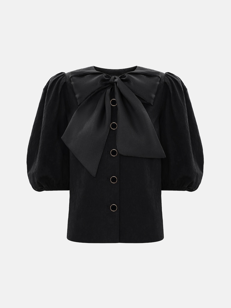 Textured blouse with a voluminous bow
