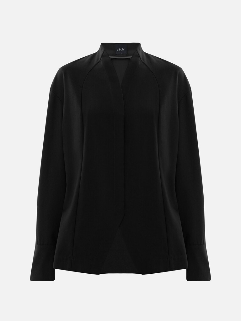 Complex cut shirt with hidden button fastening