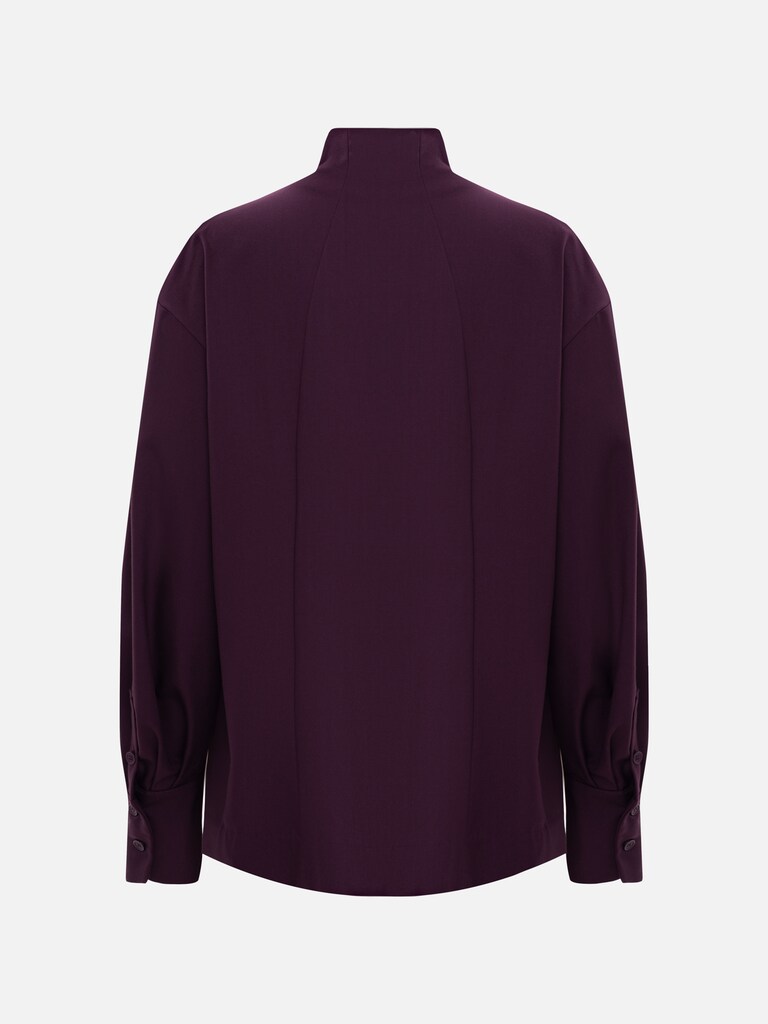 Complex cut shirt with hidden button fastening