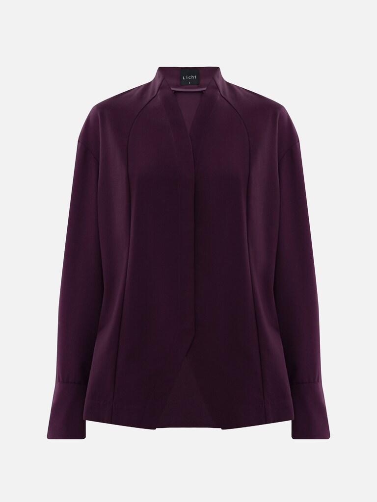 Complex cut shirt with hidden button fastening