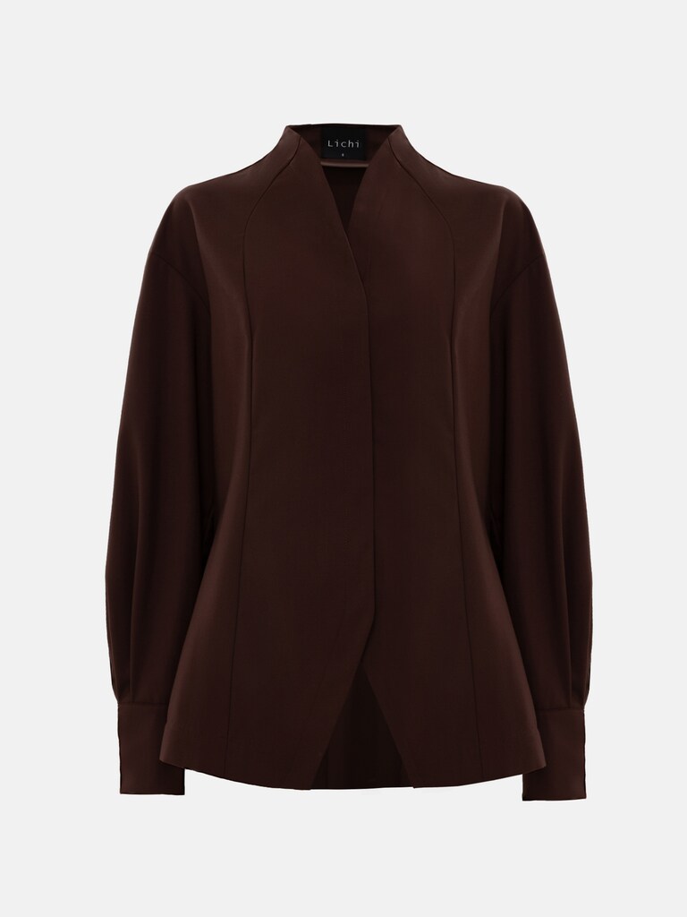 Complex cut shirt with hidden button fastening