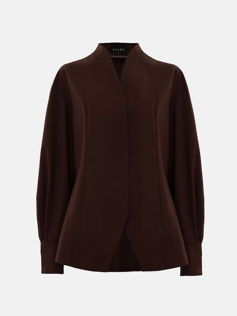 Complex cut shirt with hidden button fastening