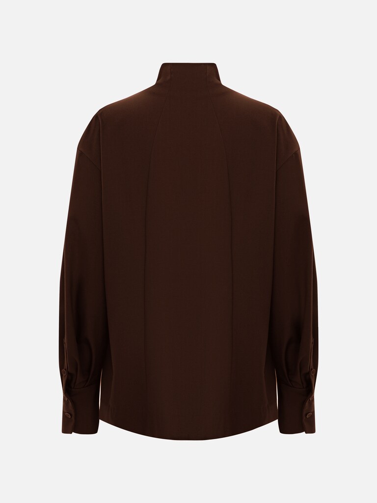 Complex cut shirt with hidden button fastening