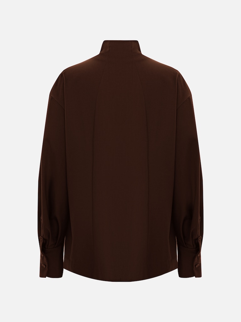 Complex cut shirt with hidden button fastening