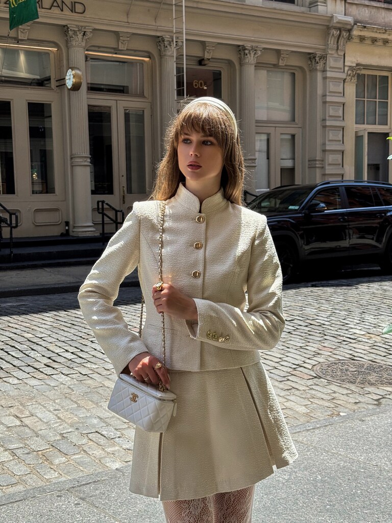 Flared mini skirt with pleats on the sides