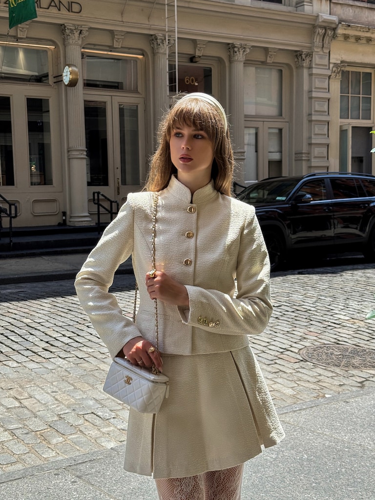 Flared mini skirt with pleats on the sides