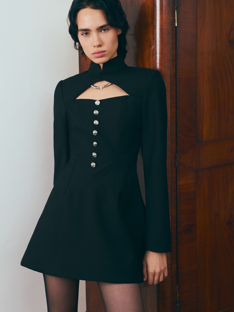 Mini dress with a cut-out at the chest and large buttons	