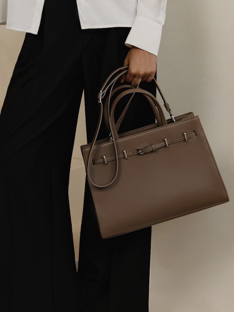 Rectangular bag with decorative strap